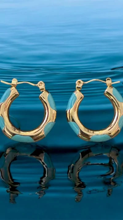 Earrings waterproof with 18krt gold layer. With aqua color enamal. Wear it always . Non-tarnish.